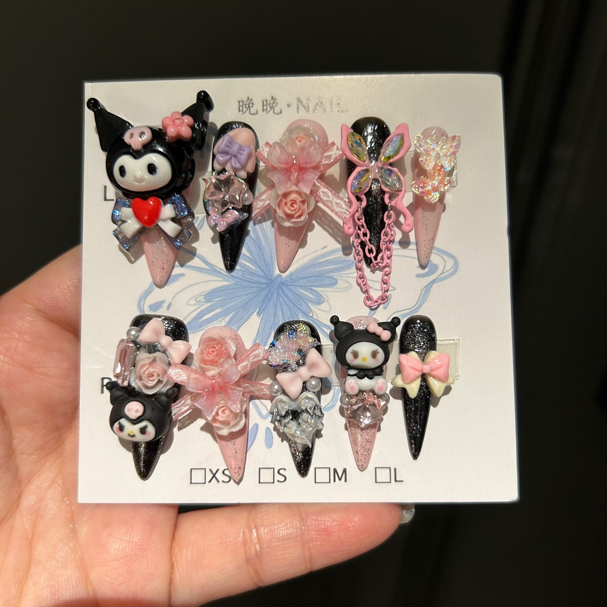 Black & Pink Stiletto Press-on Nails with 3D Kuromi, My Melody, Pink Roses, Iridescent Bow, and Chain Drop - Y2K Sanrio Kawaii Fake Nail Set