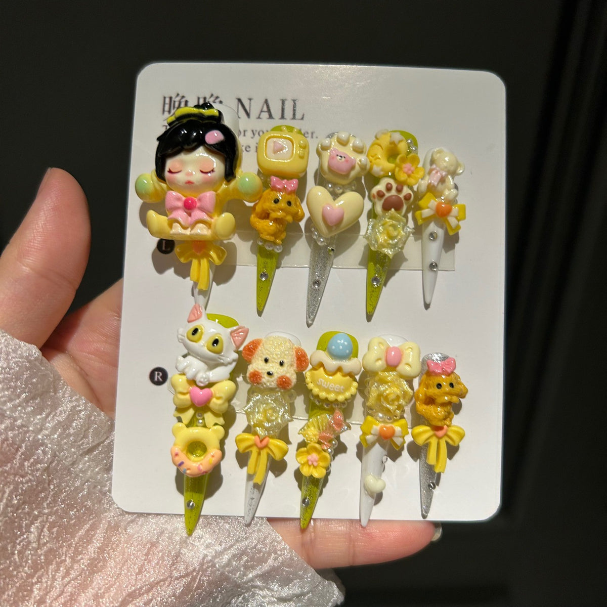 Yellow Kawaii Stiletto Press-on Nails with 3D Anime Doll, Cat Paw, Cute Puppy, and Floral Charms - Playful Art Toy Fake Nail Set