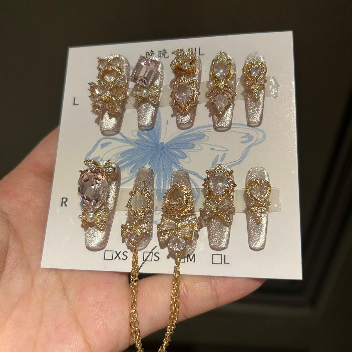 Champagne Silver Cat Eye Coffin Press-on Nails with 3D Bowknot, Crystal Jewels, and Hanging Chain Charms - Luxury Statement Fake Nail Set