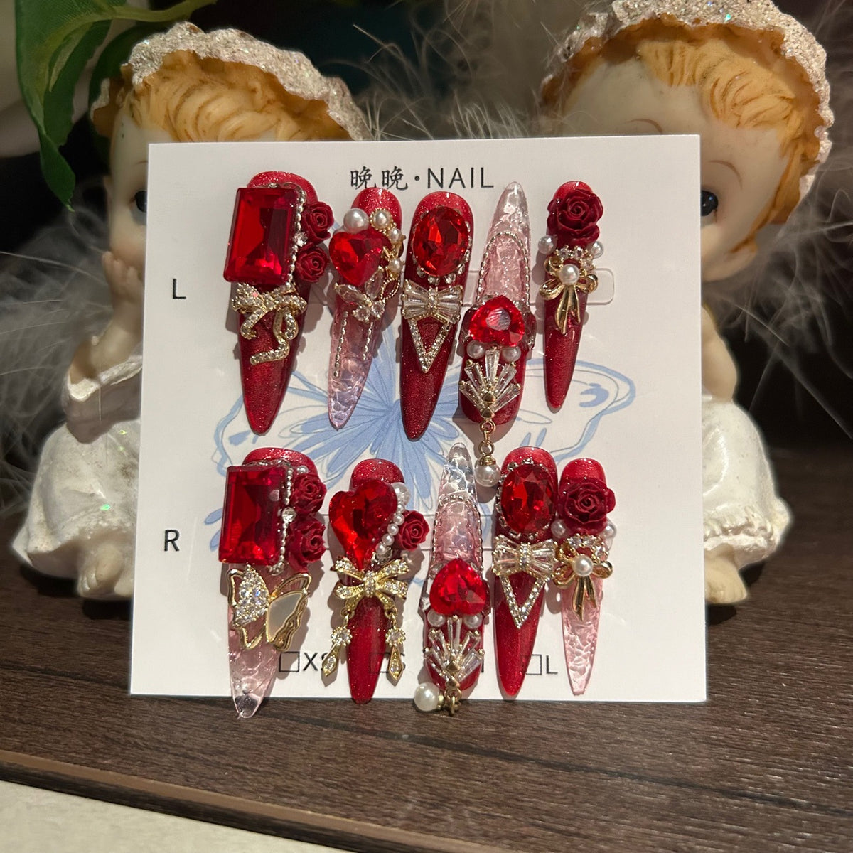 Ruby Red Cat Eye Stiletto Press-on Nails with 3D Rose, Crystal Rhinestone, and Hanging Chain Charms - Luxury Statement Fake Nail Set
