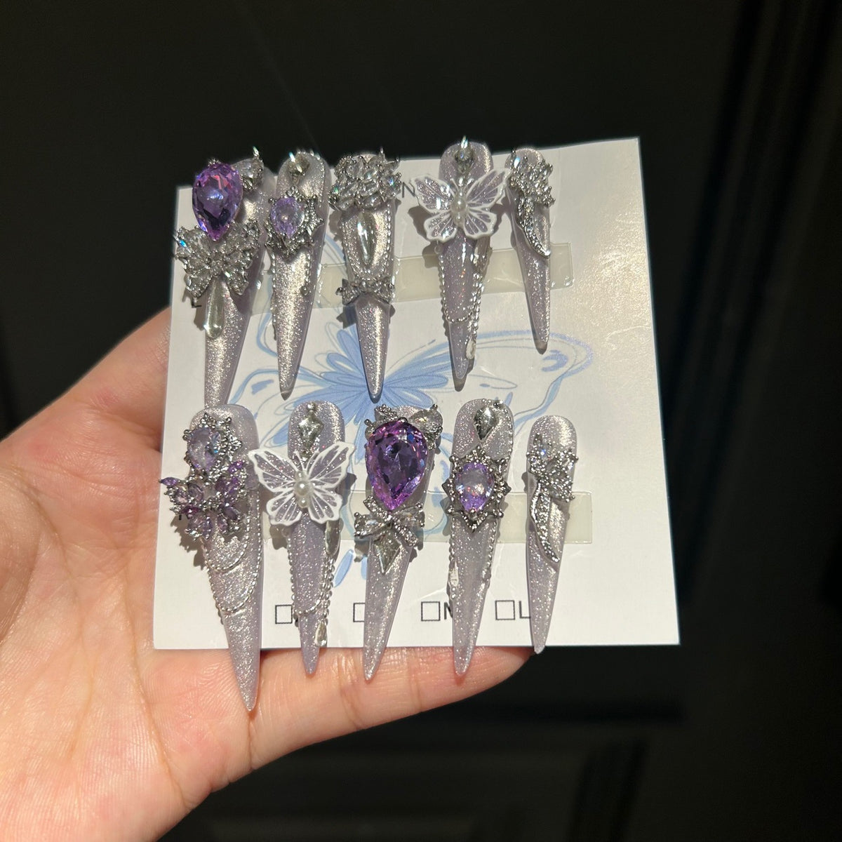 Smoky Purple Cat Eye Stiletto Press-on Nails with Over-sized Purple Crystal, White Bowknot, and Beaded Chain - Luxury Fairy Fake Nail Set