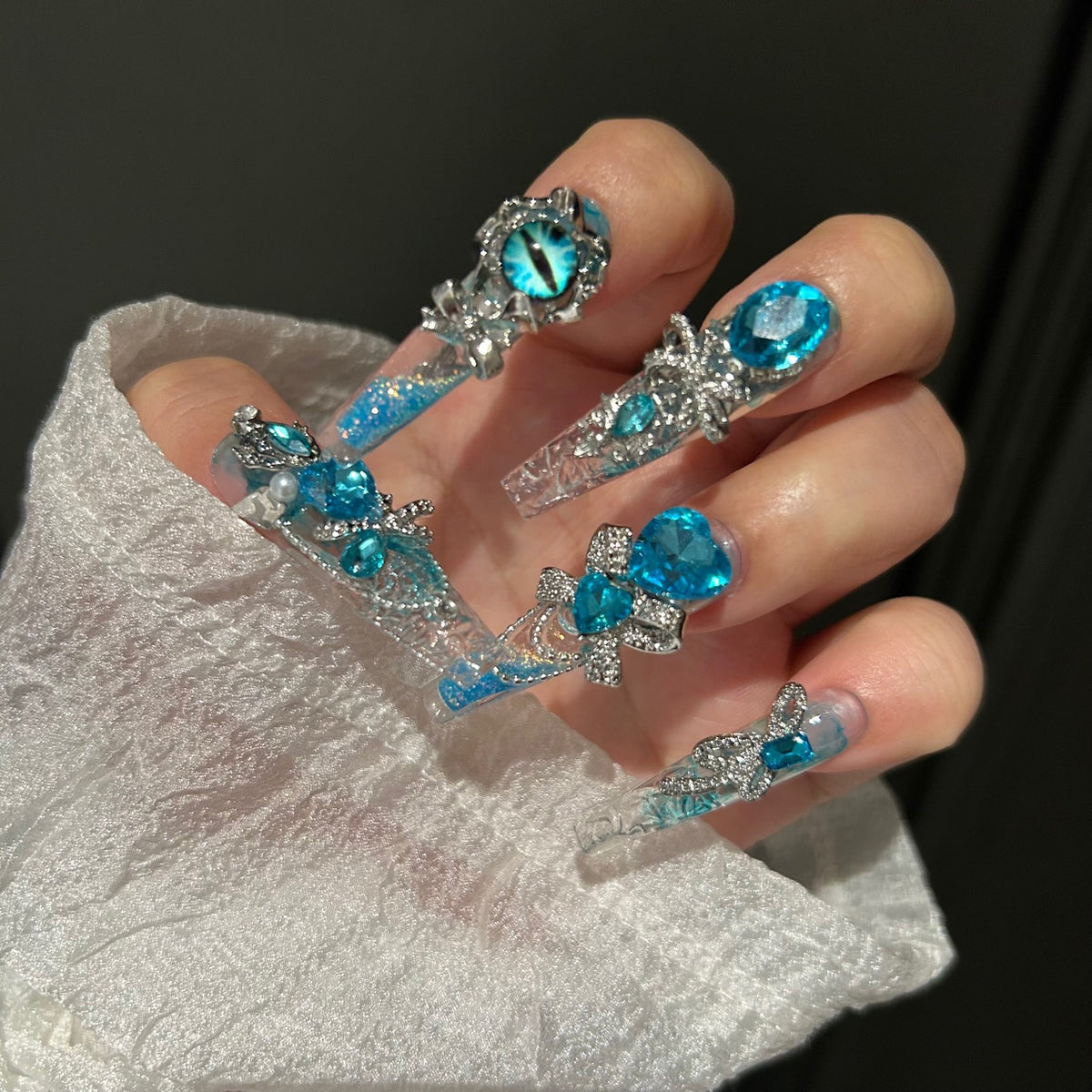 Handmade Blue Glitter Gradient Long Coffin Press On Nails with Blue Evil Eye Charms, Large Blue Heart Crystals, Rhinestone Bows & Silver Chains