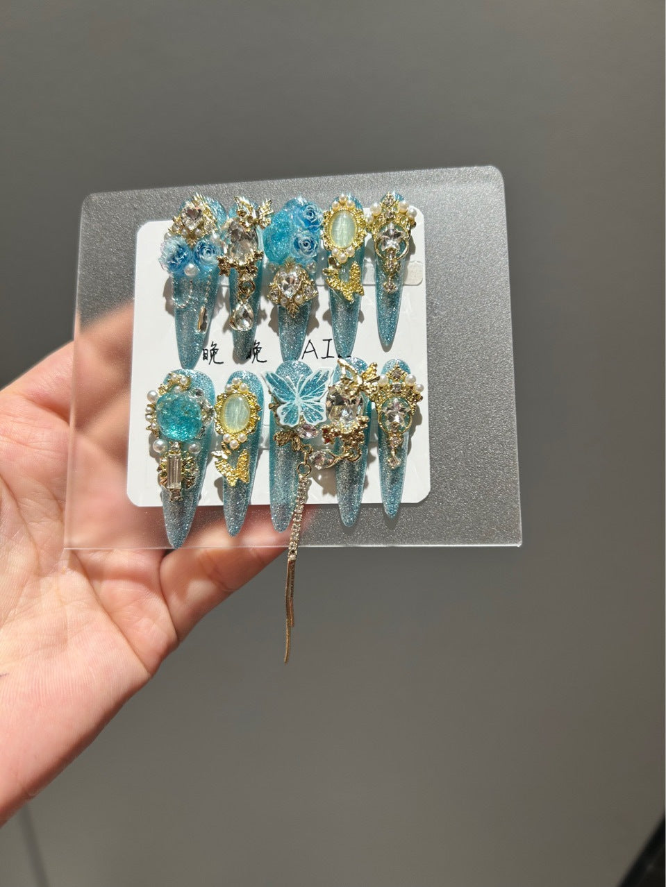 Handmade Turquoise Glitter Long Stiletto Press On Nails with 3D Blue Roses, Lace Butterfly, Gold Frame Charms & Dangling Chains