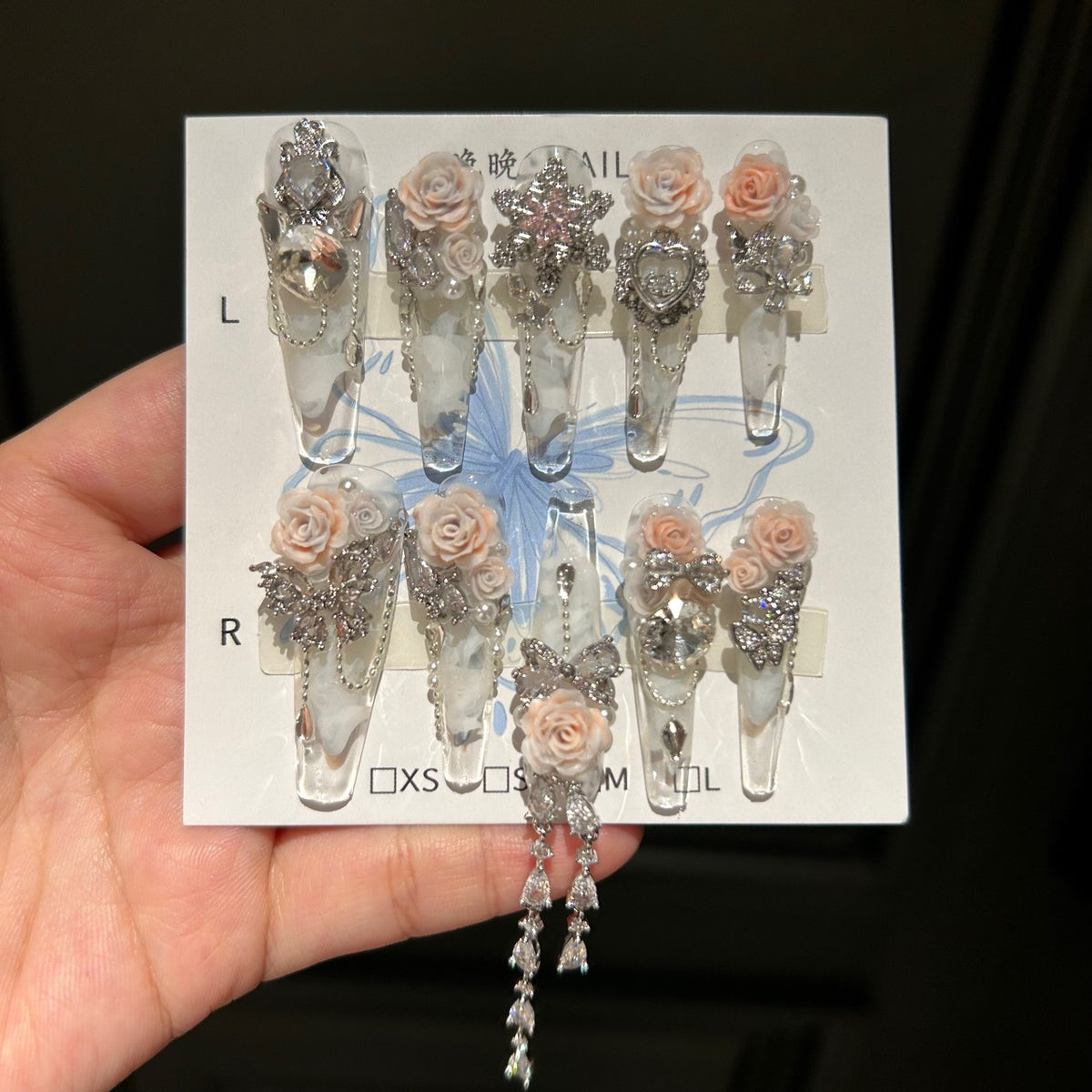 Handmade Clear Marble Long Stiletto Press On Nails with 3D Peach Roses, Silver Rhinestone Butterfly & Bow Charms, Heart Crystals & Dangling Chains