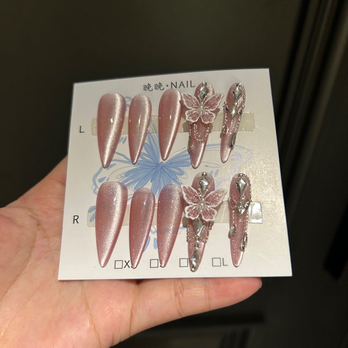 Handmade Dusty Pink Pearl Cat Eye Long Stiletto Press On Nails with Pink Glitter Butterfly Charms, Silver Rhinestones & Delicate Dangling Chains