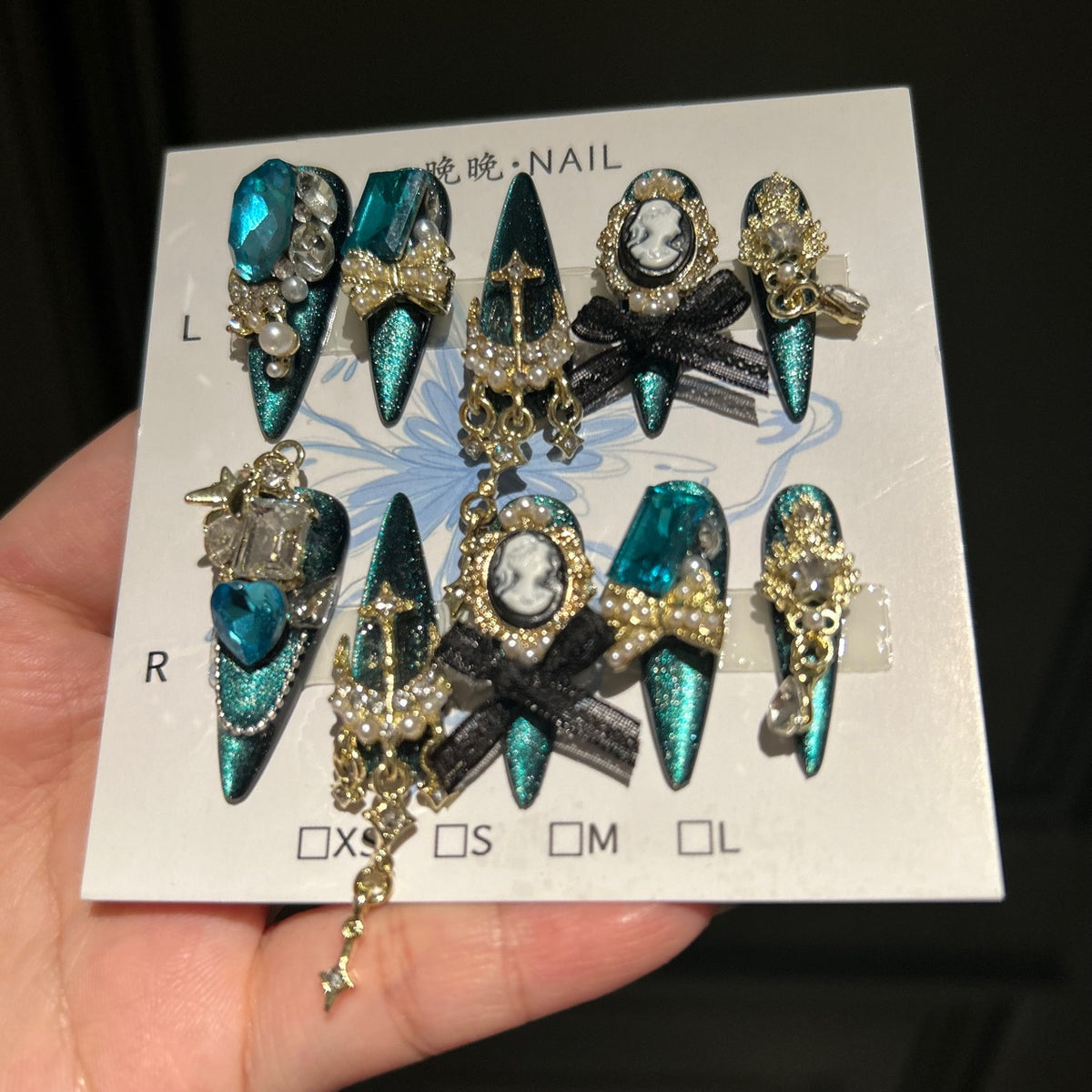 Handmade Teal Cat Eye Long Stiletto Press On Nails with Giant Blue Crystals, Vintage Cameo, Gold Filigree & Black Bows