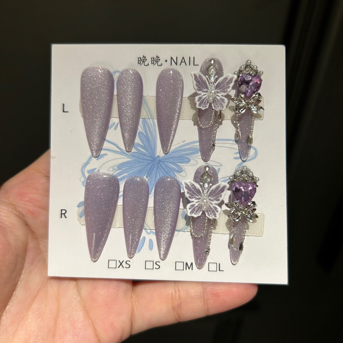 Handmade Lavender Cat Eye Press On Nails, Long Stiletto Fairy False Nails with 3D White Butterfly, Large Purple Heart Rhinestone, Pearls & Dangling Chain, Reusable Fake Nails for Wedding & Party