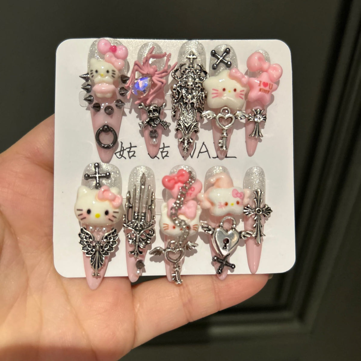 Handmade Pink Gothic Hello Kitty Long Stiletto Press On Nails with Spikes, Cross & Wing Charms