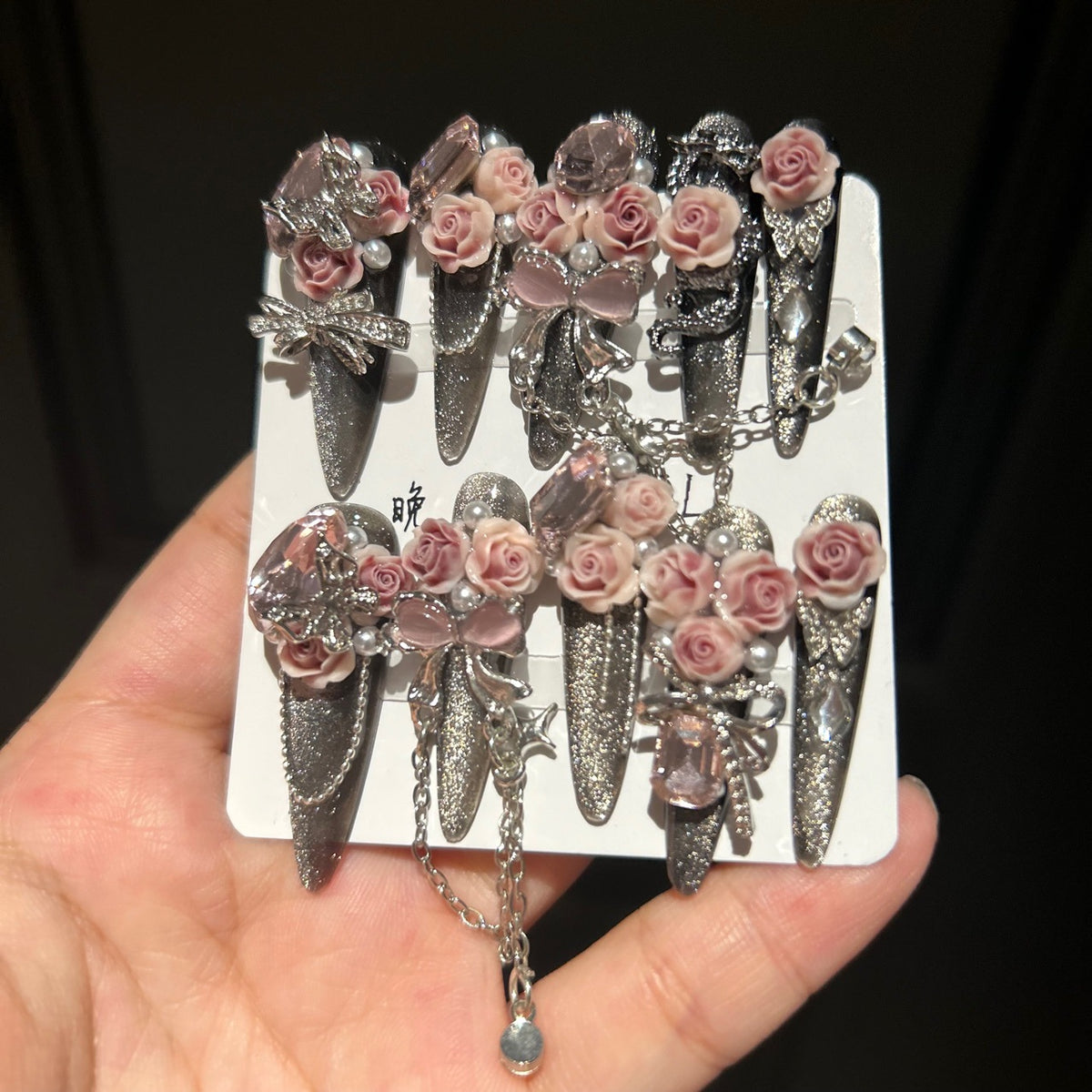Handmade Dark Glitter Long Stiletto Press On Nails with 3D Dusty Pink Roses, Pink Crystal Charms, Bows, Butterfly Rhinestones & Interlinked Silver Chains