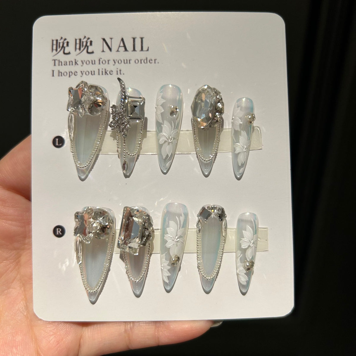Holographic White Cat Eye Stiletto Press-on Nails with 3D Sculpted Floral, Crystal Jewels, and Pearl Beaded Chain - Luxury Fairy Fake Nail Set