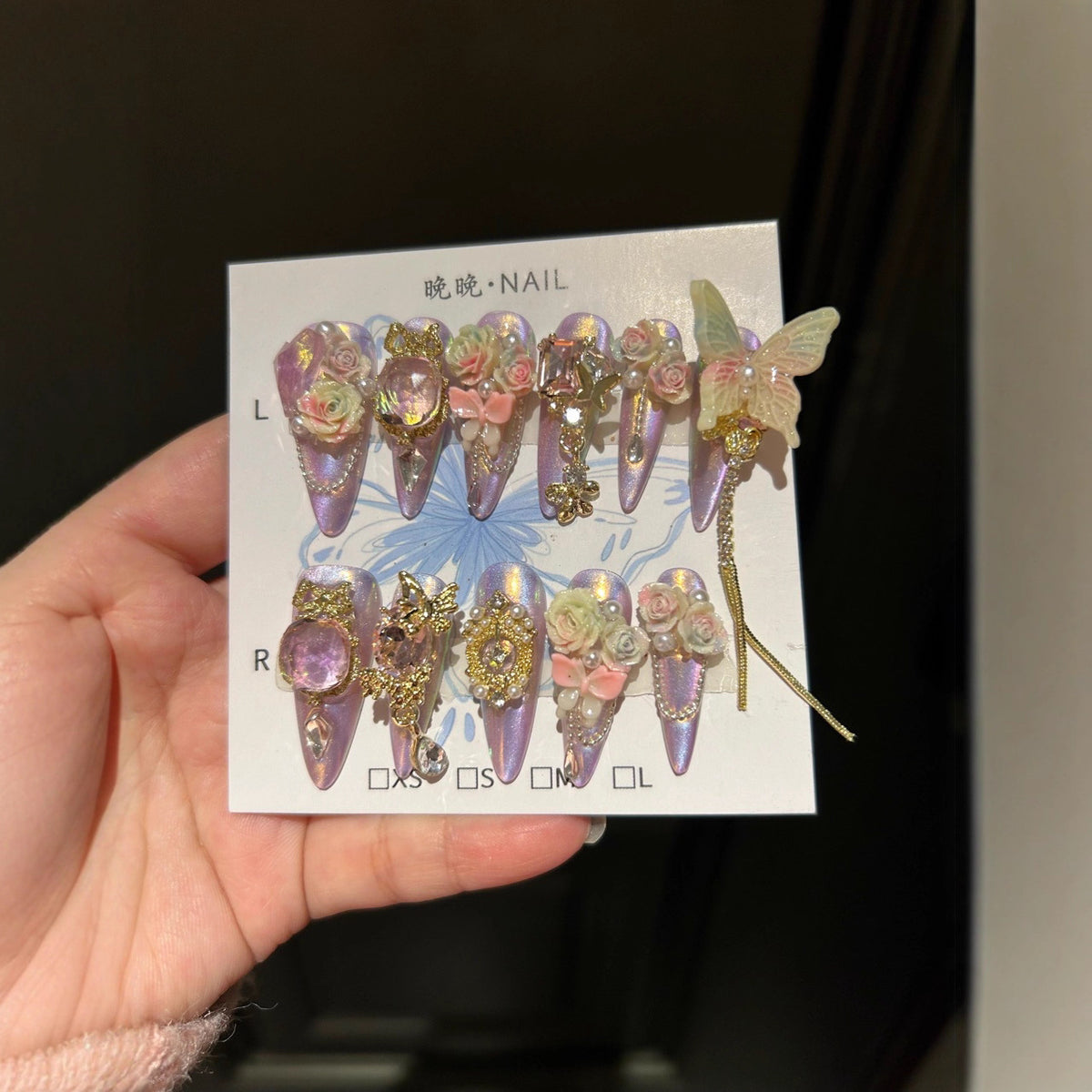 Holographic Purple-Pink Cat Eye Stiletto Press-on Nails with Oversized Fairy Butterfly, 3D Gradient Roses, Vintage Gold Frame, and Draping Chain - Fantasy Glam Fake Nail Set