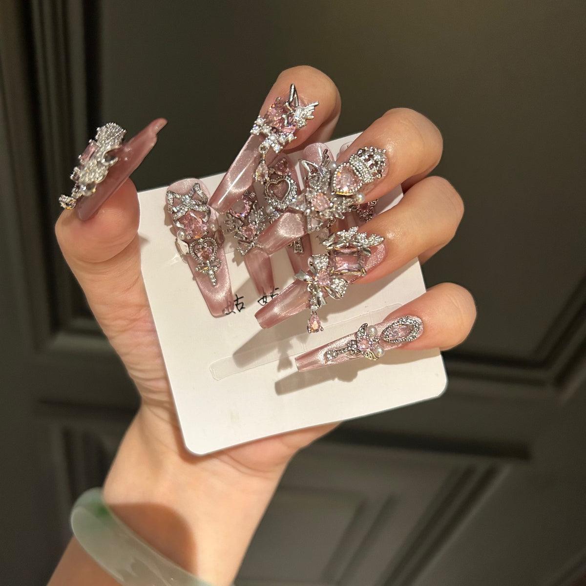 Handmade Pink Cat Eye Long Coffin Press On Nails with Pink Heart Crystals, Crown & Cross Rhinestone Ornaments, Pearl Accents & Dangling Charms