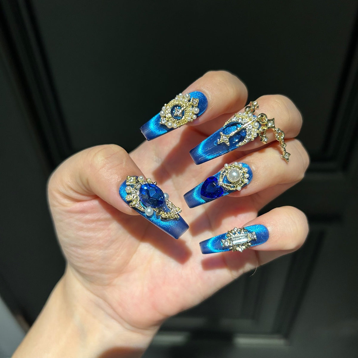 Handmade Sapphire Blue Cat Eye Long Coffin Press On Nails with Large Sapphire Crystals, Gold Star & Butterfly Charms, Pearls & Dangling Gold Chains