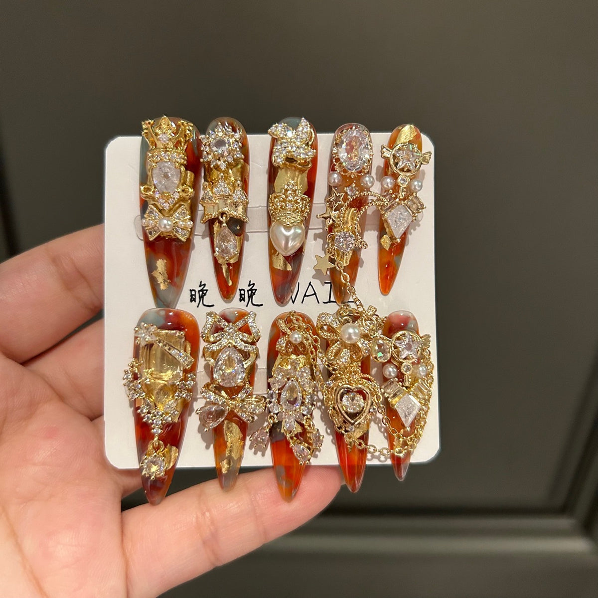Handmade Amber Marble Long Stiletto Press On Nails with Gold Filigree, Crown & Large Crystal Charms