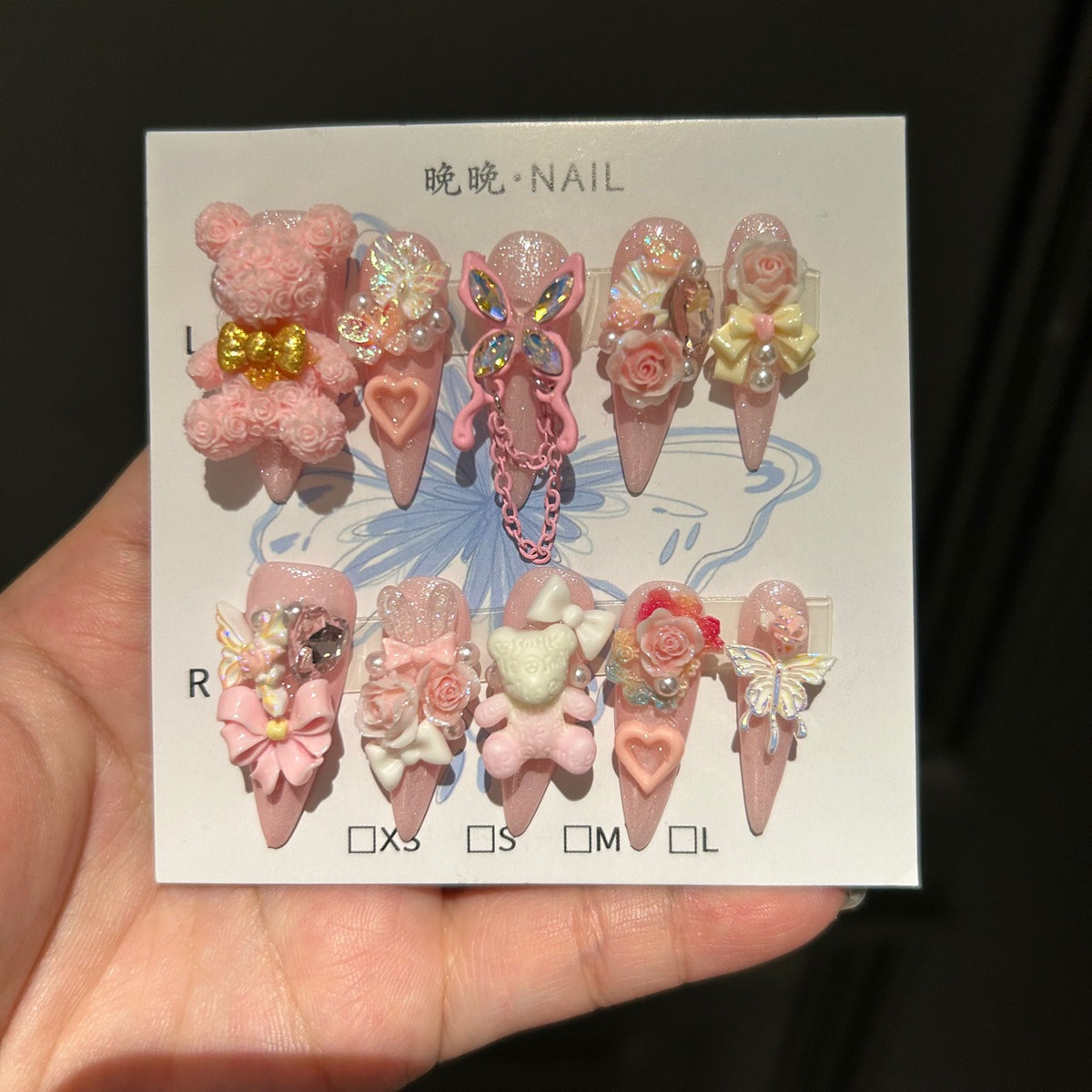 Handmade Pink Glitter Long Stiletto Press On Nails with 3D Rose Bear Charms, Butterfly Ornaments, 3D Roses, Bows, Heart Gems & Pink Chain