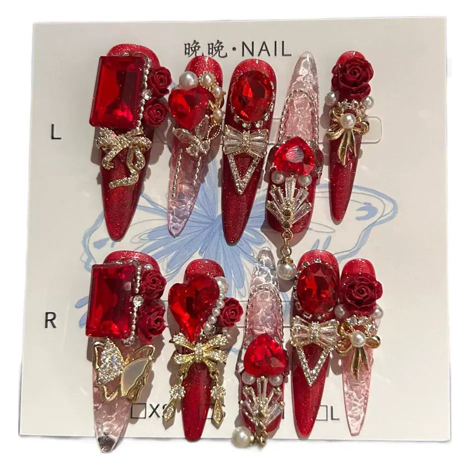 Ruby Red Cat Eye Stiletto Press-on Nails with 3D Rose, Crystal Rhinestone, and Hanging Chain Charms - Luxury Statement Fake Nail Set