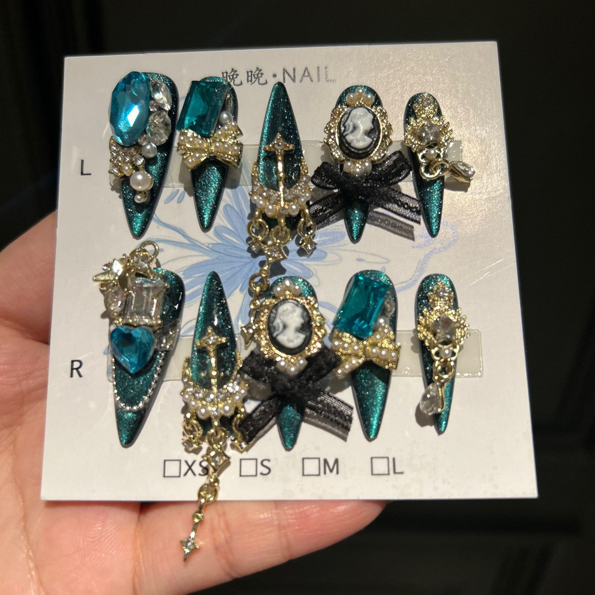 Handmade Teal Cat Eye Long Stiletto Press On Nails with Giant Blue Crystals, Vintage Cameo, Gold Filigree & Black Bows
