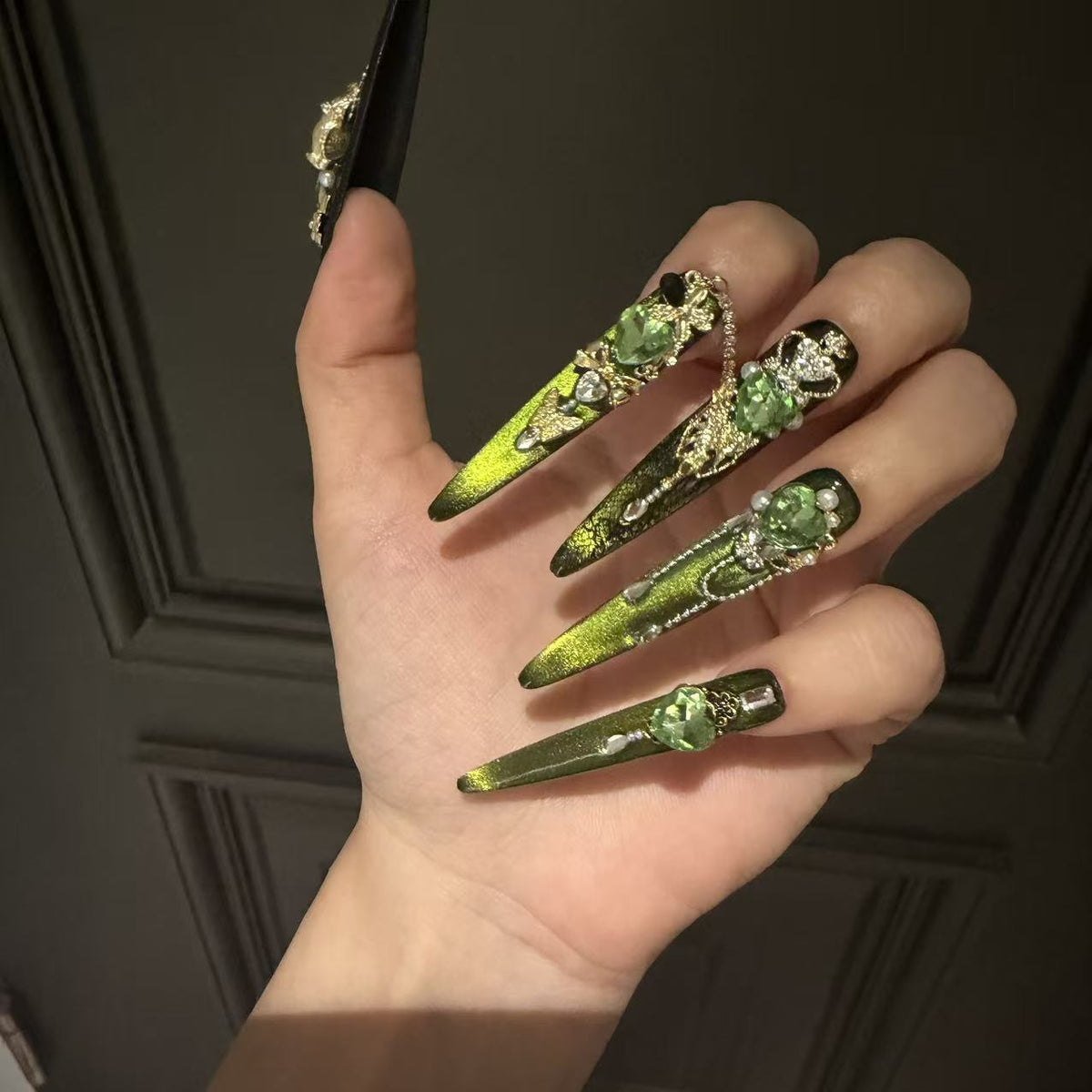 Green Cat Eye Stiletto Press-on Nails with 3D Crown, Crystal Rhinestone, and Chain Charms - Luxury Goth Fake Nail Set