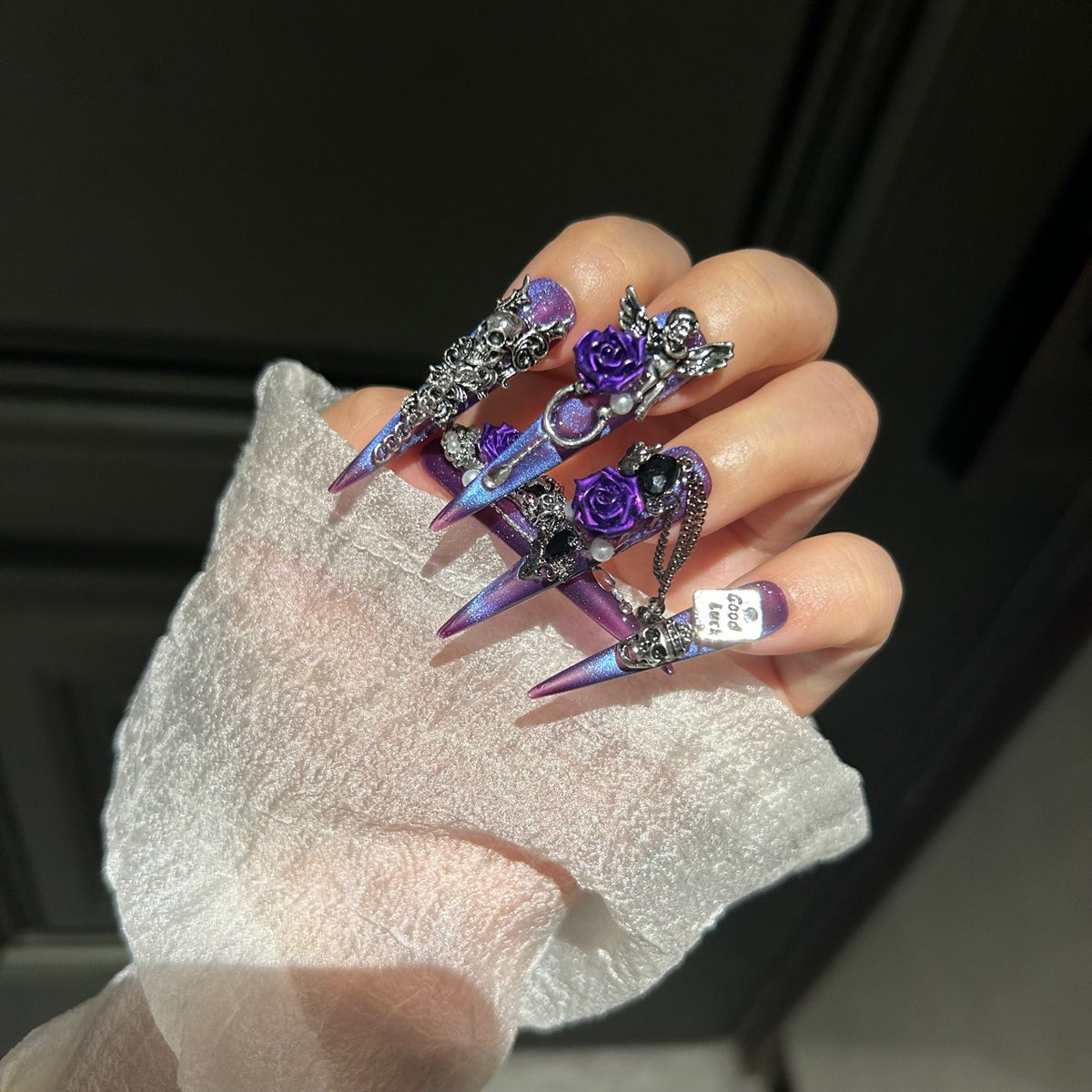 Handmade Purple Blue Cat Eye Long Stiletto Press On Nails with 3D Purple Roses, Silver Skull Charms, Black Crystals, Pearls & Dangling Chains