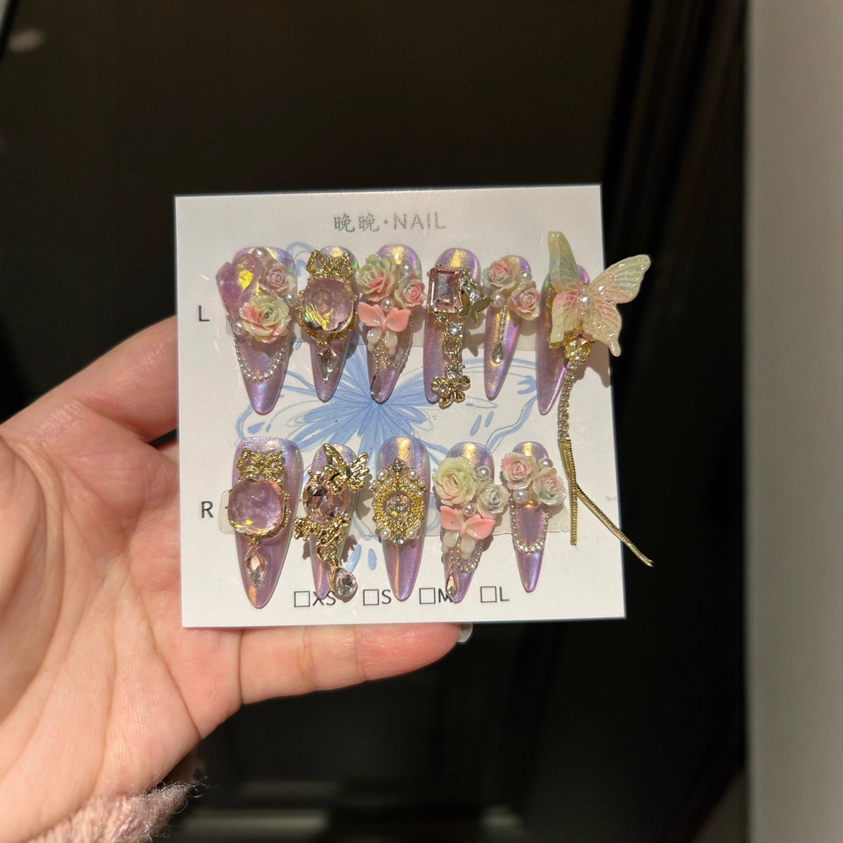 Holographic Purple-Pink Cat Eye Stiletto Press-on Nails with Oversized Fairy Butterfly, 3D Gradient Roses, Vintage Gold Frame, and Draping Chain - Fantasy Glam Fake Nail Set