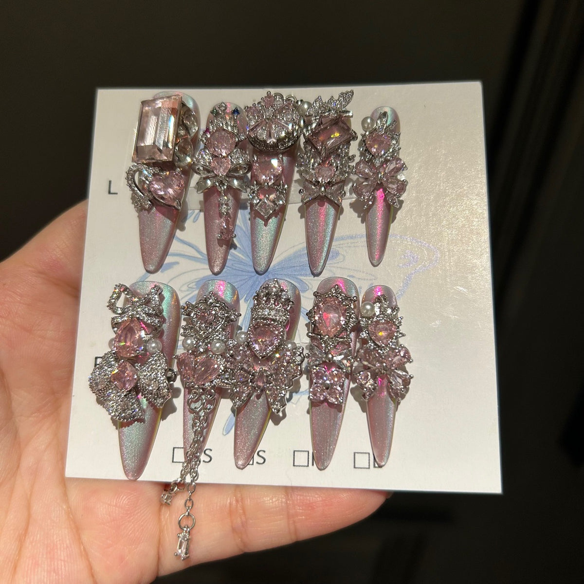 Holographic Pink Cat Eye Stiletto Press-on Nails with 3D Pink Crystal Gems, Bowknot, and Hanging Chain Charms - Luxury Fairy Fake Nail Set
