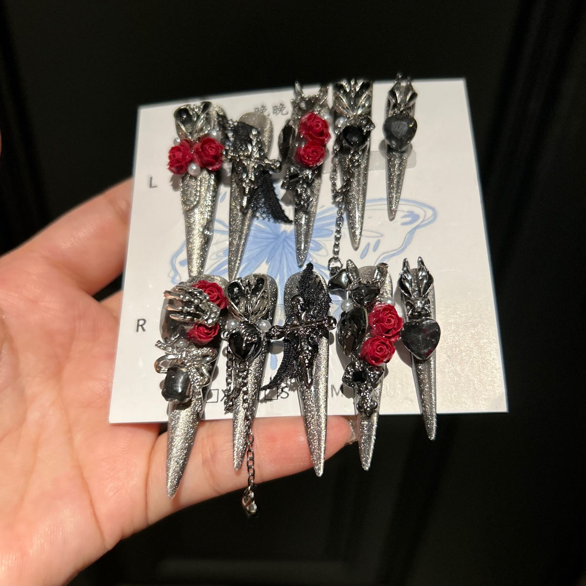 Handmade Silver Glitter Press On Nails, Long Stiletto Gothic Vampire False Nails with 3D Red Roses, Skeleton Hand, Cross & Skull Charms, Black Lace, Pearls, Black Gems & Dangling Metal Chains, Reusable Fake Nails for Cosplay, Halloween & Party