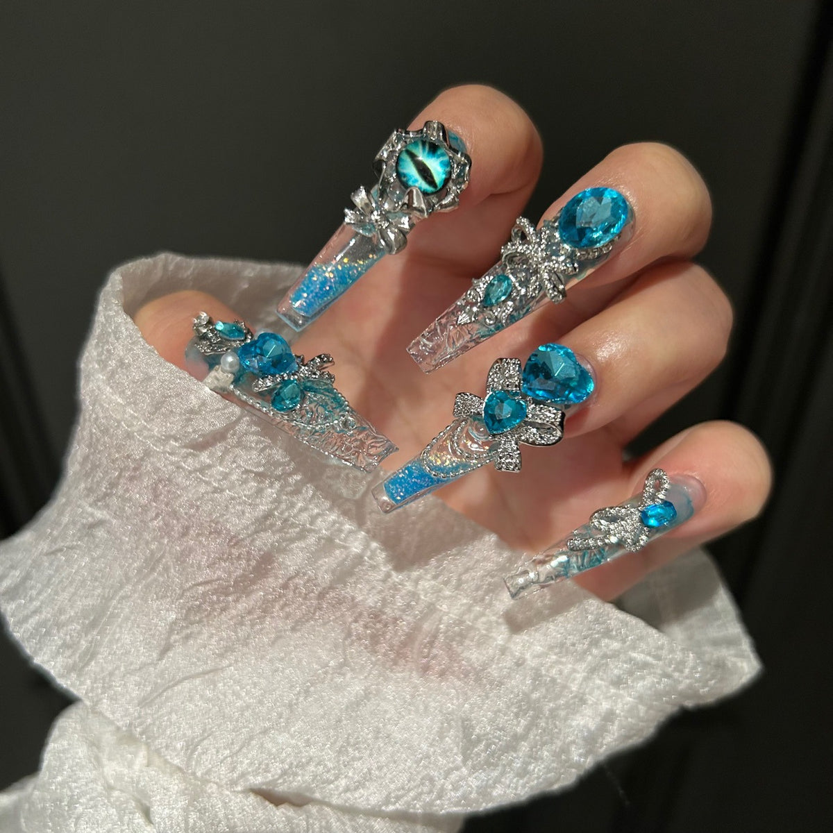 Handmade Blue Glitter Gradient Long Coffin Press On Nails with Blue Evil Eye Charms, Large Blue Heart Crystals, Rhinestone Bows & Silver Chains