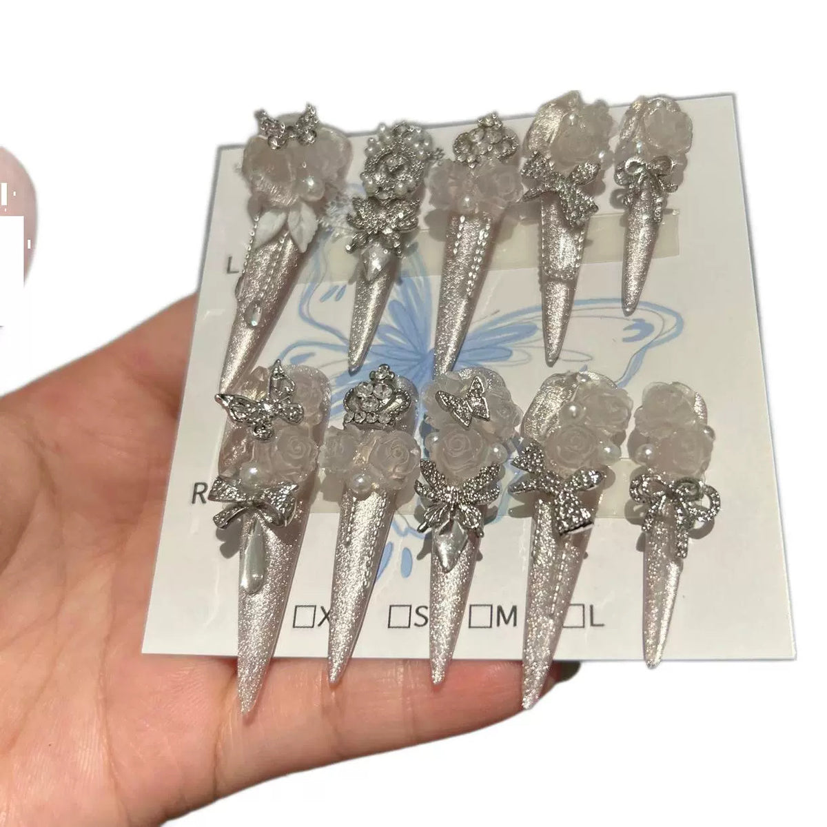 Handmade Silver Glitter Long Stiletto Press On Nails with Frosted White Roses, Rhinestone Bows & Butterfly Charms