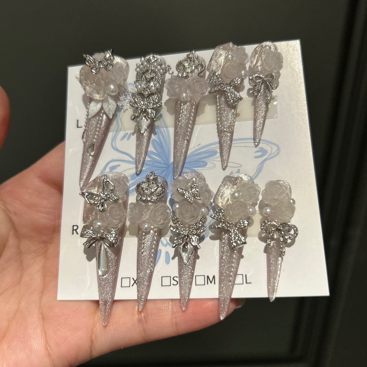 Handmade Silver Glitter Long Stiletto Press On Nails with Frosted White Roses, Rhinestone Bows & Butterfly Charms