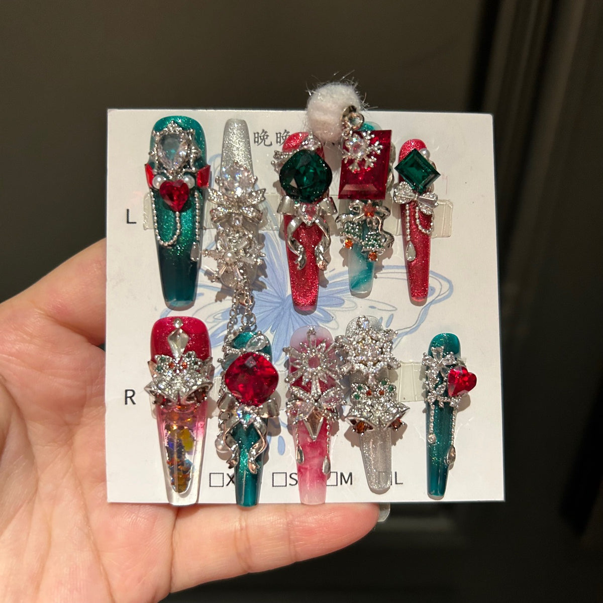 Red and Green Christmas Coffin Press-on Nails with 3D Ruby, Emerald Gem, Snowflake, and Hanging Chain Charms - Holiday Glam Fake Nail Set