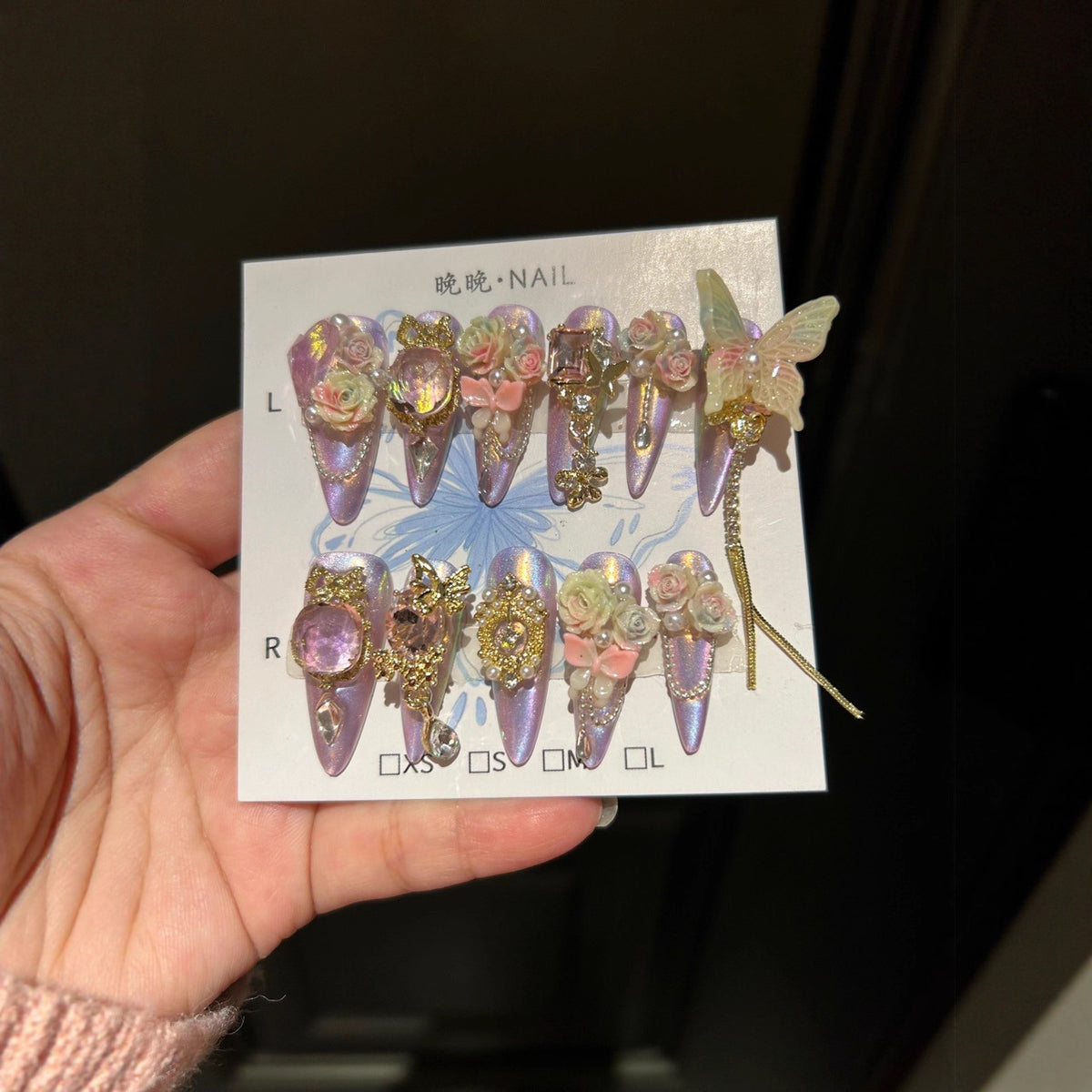 Holographic Purple-Pink Cat Eye Stiletto Press-on Nails with Oversized Fairy Butterfly, 3D Gradient Roses, Vintage Gold Frame, and Draping Chain - Fantasy Glam Fake Nail Set