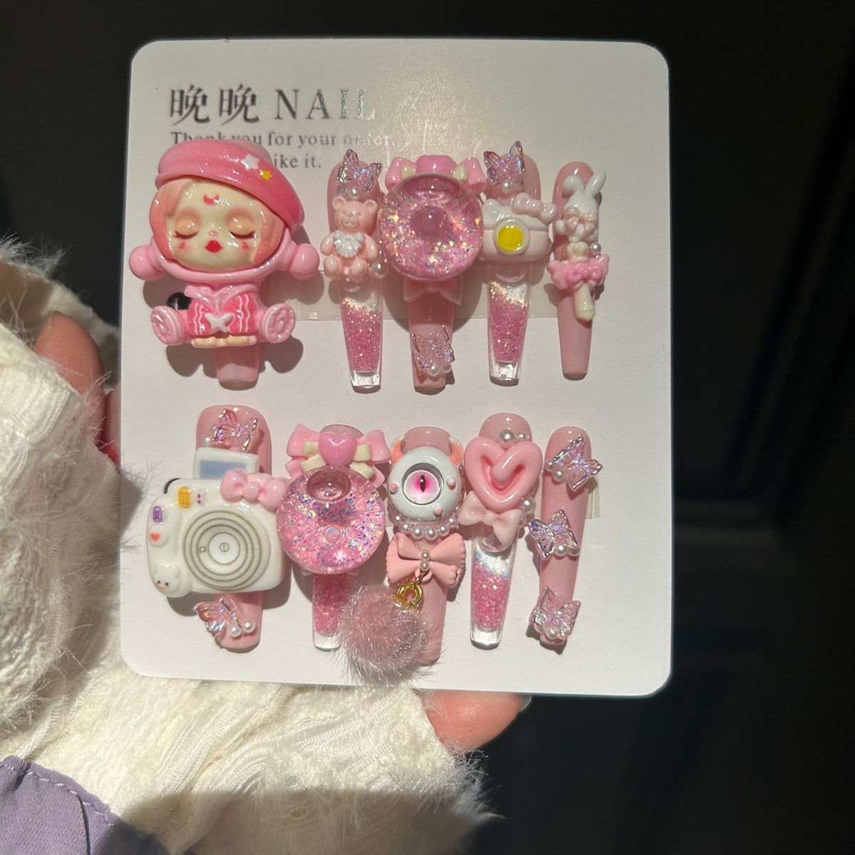 Handmade Pink Kawaii Press On Nails, Long Stiletto Weirdcore False Nails with 3D Sleeping Doll, Camera, Eyeball, Bunny & Bear Charms, Glitter Bubble Ball, Butterfly & Bow Rhinestones, Reusable Fake Nails for Cosplay & Party