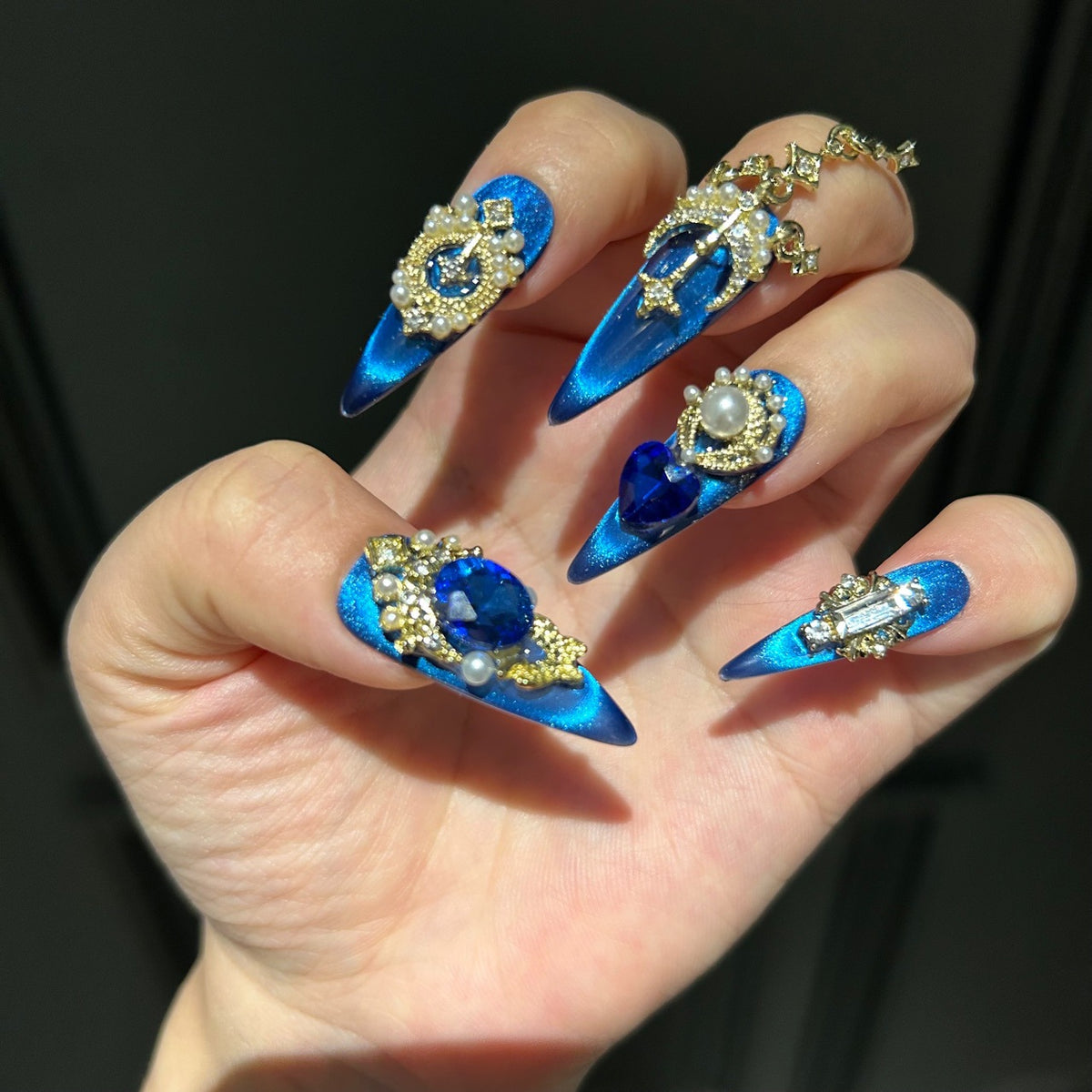 Handmade Sapphire Blue Cat Eye Long Coffin Press On Nails with Large Sapphire Crystals, Gold Star & Butterfly Charms, Pearls & Dangling Gold Chains