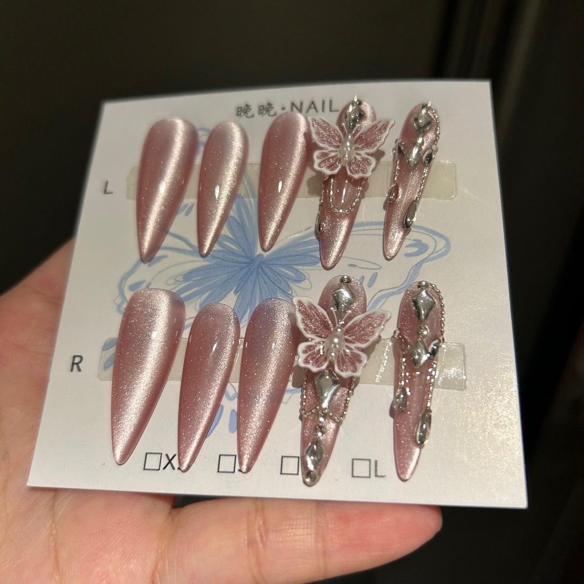 Handmade Dusty Pink Pearl Cat Eye Long Stiletto Press On Nails with Pink Glitter Butterfly Charms, Silver Rhinestones & Delicate Dangling Chains