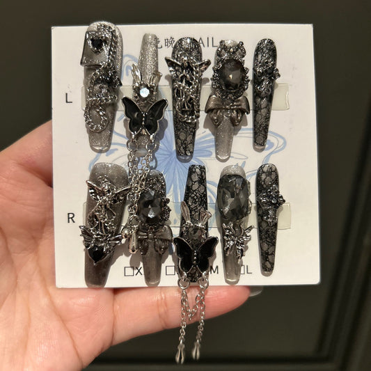 Dark Silver Cat Eye Coffin Press-on Nails with 3D Black Crystal, Lace Texture, Angel, and Hanging Chain Charms - Gothic Glam Fake Nail Set