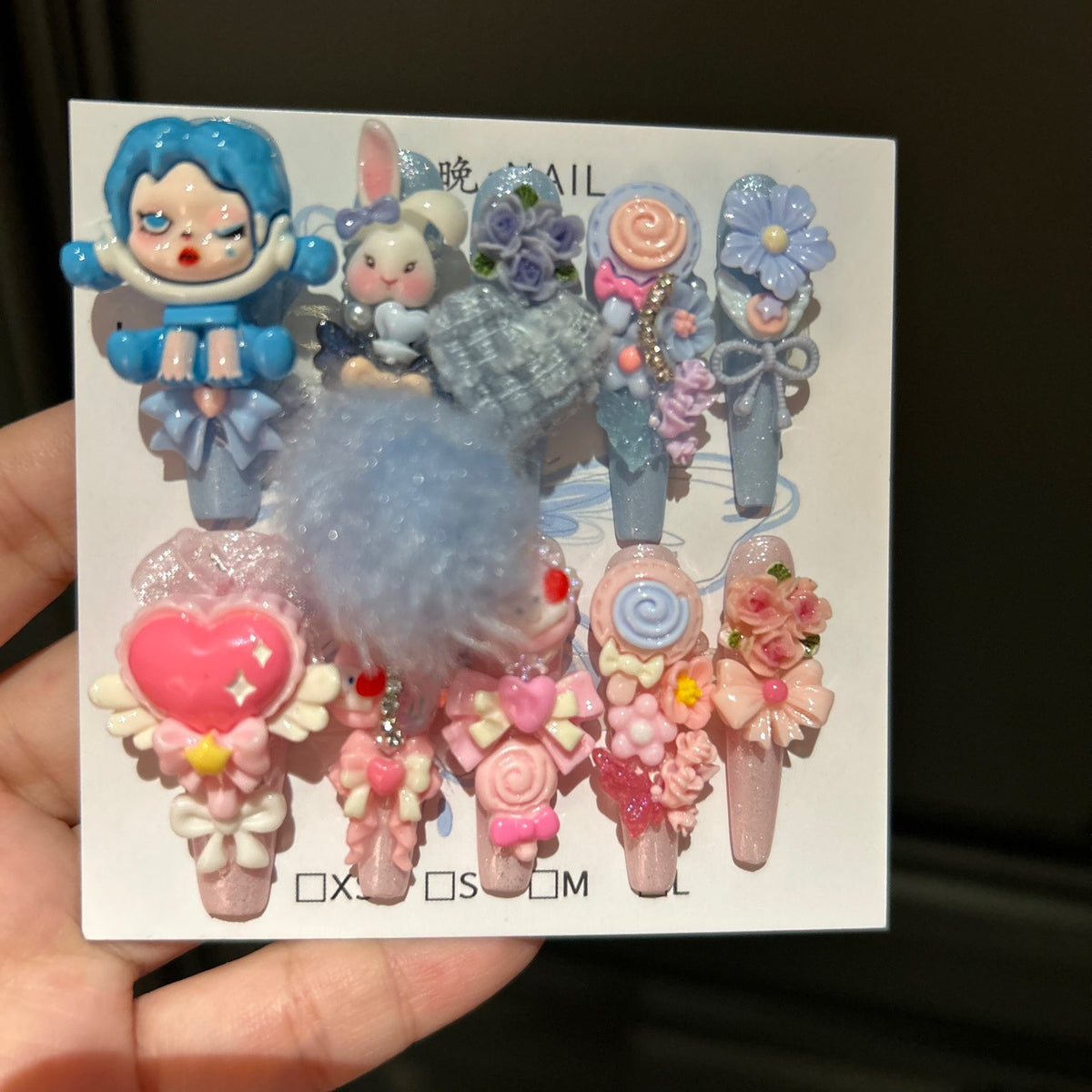 Y2K Blue and Pink Coffin Press-on Nails with 3D Anime Doll, Fluffy Pom-Pom, Lollipop, and Cute Cartoon Charms - Sweet & Cool Fake Nail Set