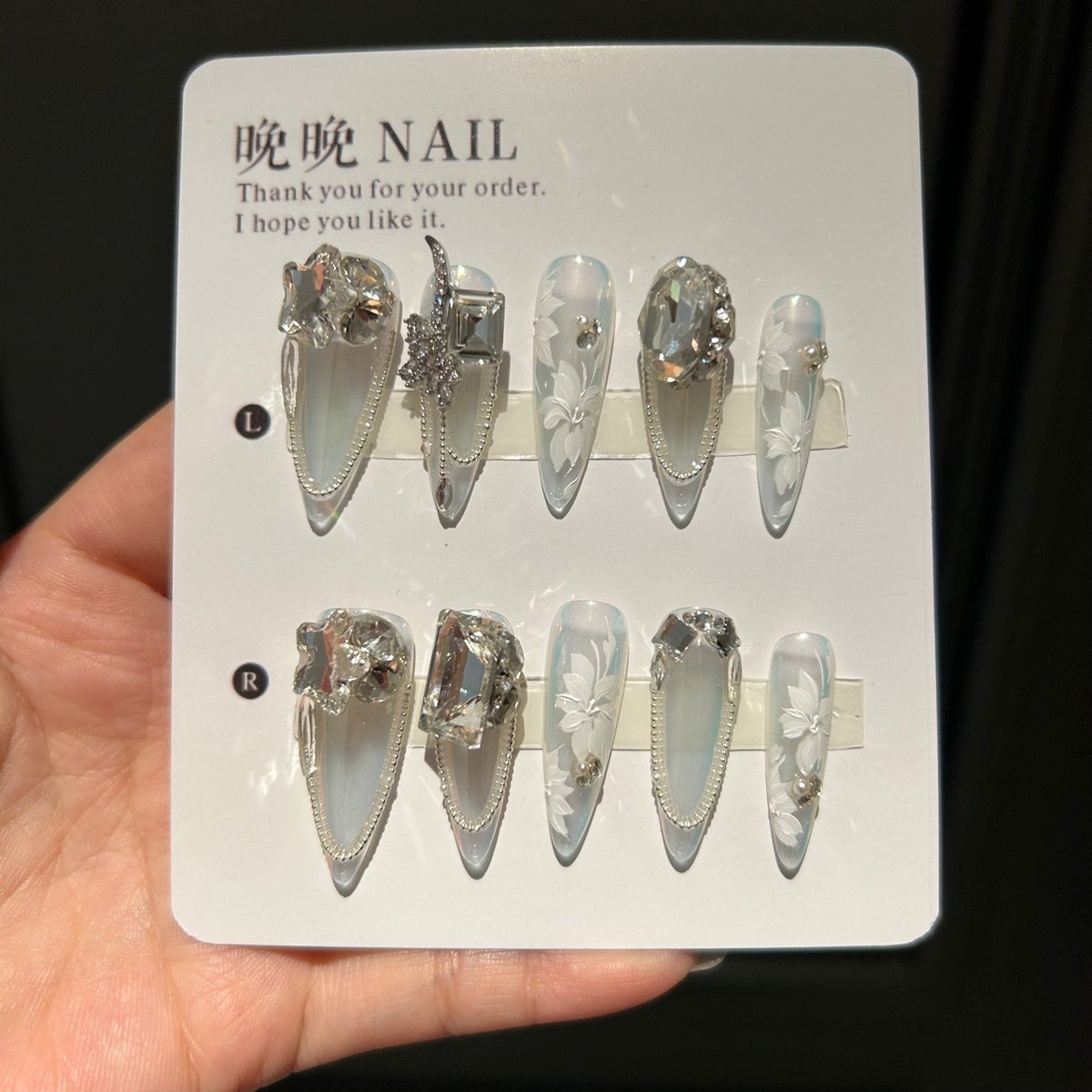 Holographic White Cat Eye Stiletto Press-on Nails with 3D Sculpted Floral, Crystal Jewels, and Pearl Beaded Chain - Luxury Fairy Fake Nail Set