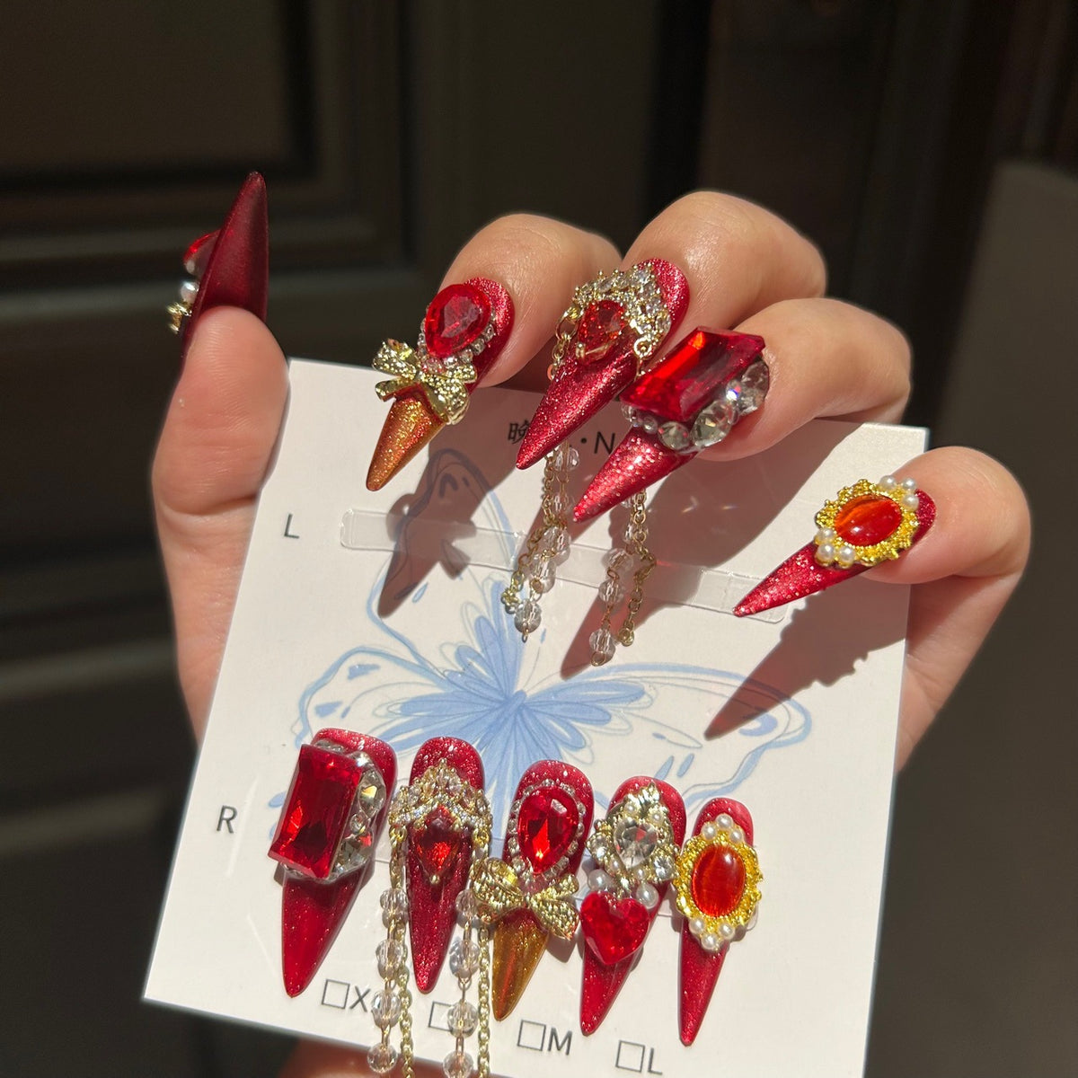 Handmade Red Glitter Press On Nails, Long Stiletto Luxury Royal False Nails with Large Ruby Rhinestones, Gold Charms, Pearls & Long Dangling Crystal Chains, Reusable Fake Nails for Party, Cosplay & Holiday