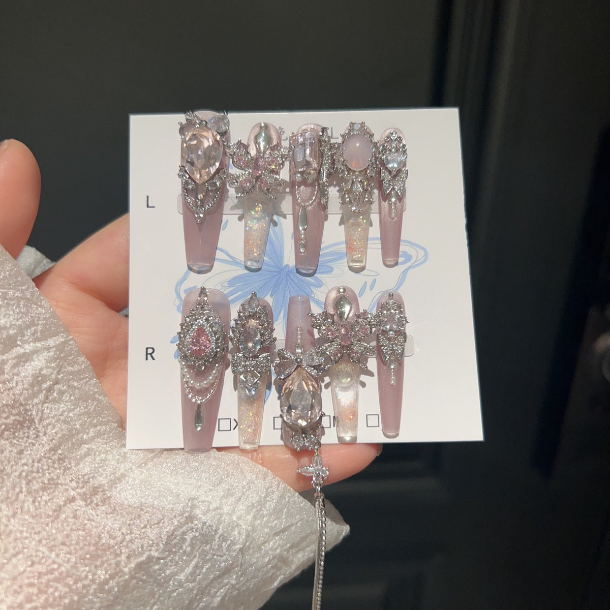 Smoky Pink Cat Eye Coffin Press-on Nails with Over-sized Pink Crystal Gems, Silver Bow, and Hanging Chain - Luxury Glam Fake Nail Set