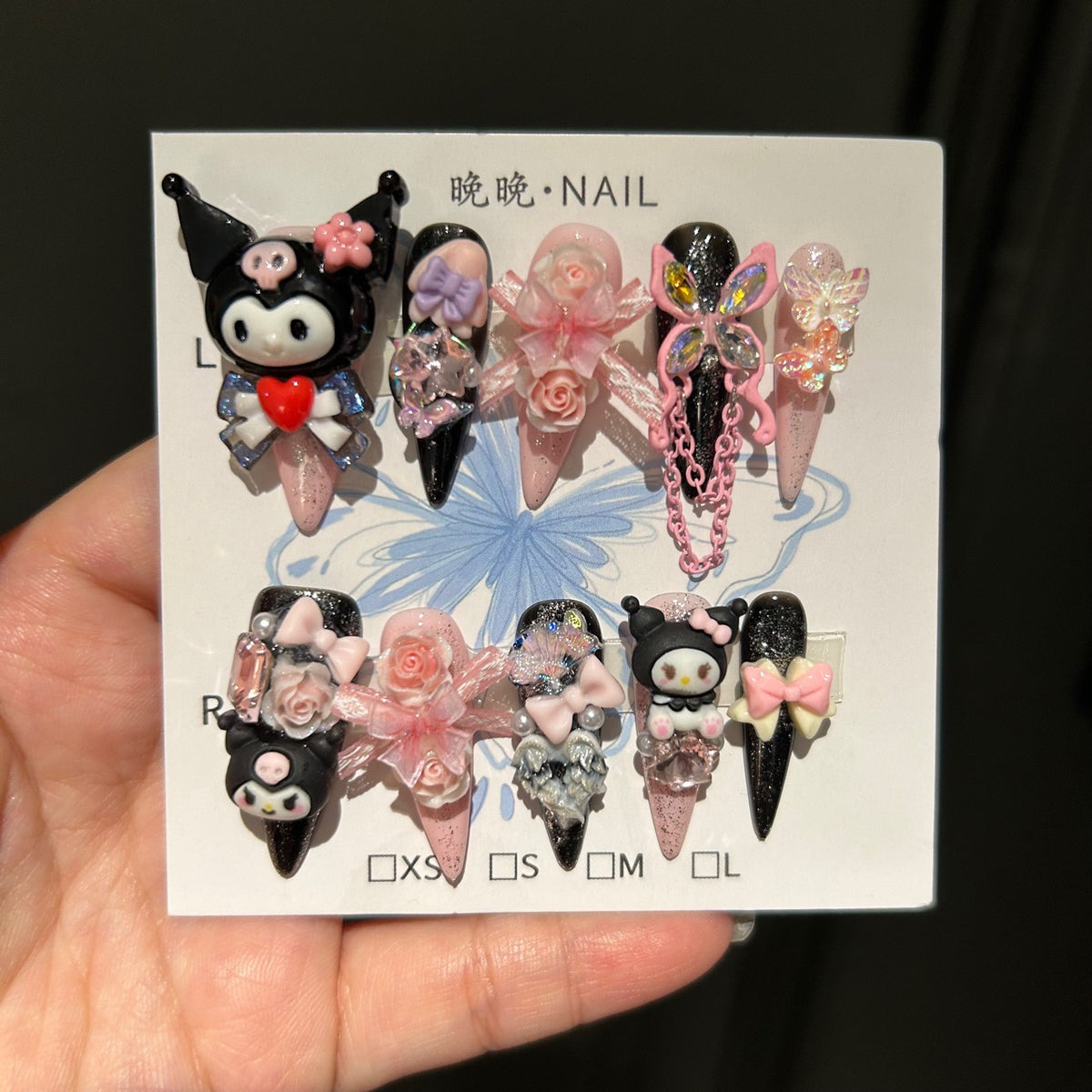 Black & Pink Stiletto Press-on Nails with 3D Kuromi, My Melody, Pink Roses, Iridescent Bow, and Chain Drop - Y2K Sanrio Kawaii Fake Nail Set