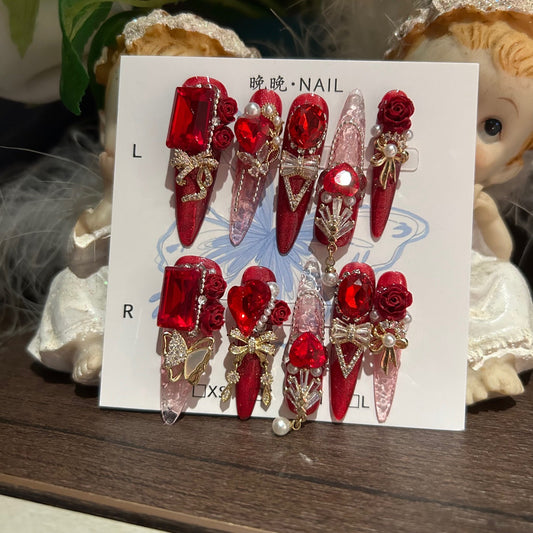 Ruby Red Cat Eye Stiletto Press-on Nails with 3D Rose, Crystal Rhinestone, and Hanging Chain Charms - Luxury Statement Fake Nail Set