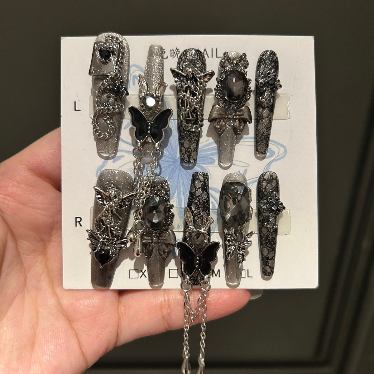 Dark Silver Cat Eye Coffin Press-on Nails with 3D Black Crystal, Lace Texture, Angel, and Hanging Chain Charms - Gothic Glam Fake Nail Set