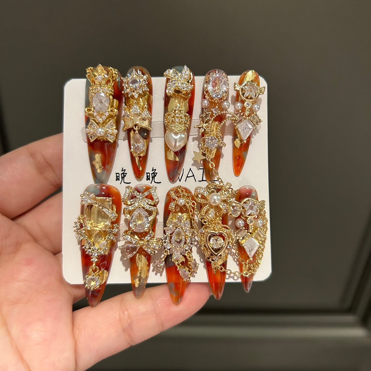 Handmade Amber Marble Long Stiletto Press On Nails with Gold Filigree, Crown & Large Crystal Charms