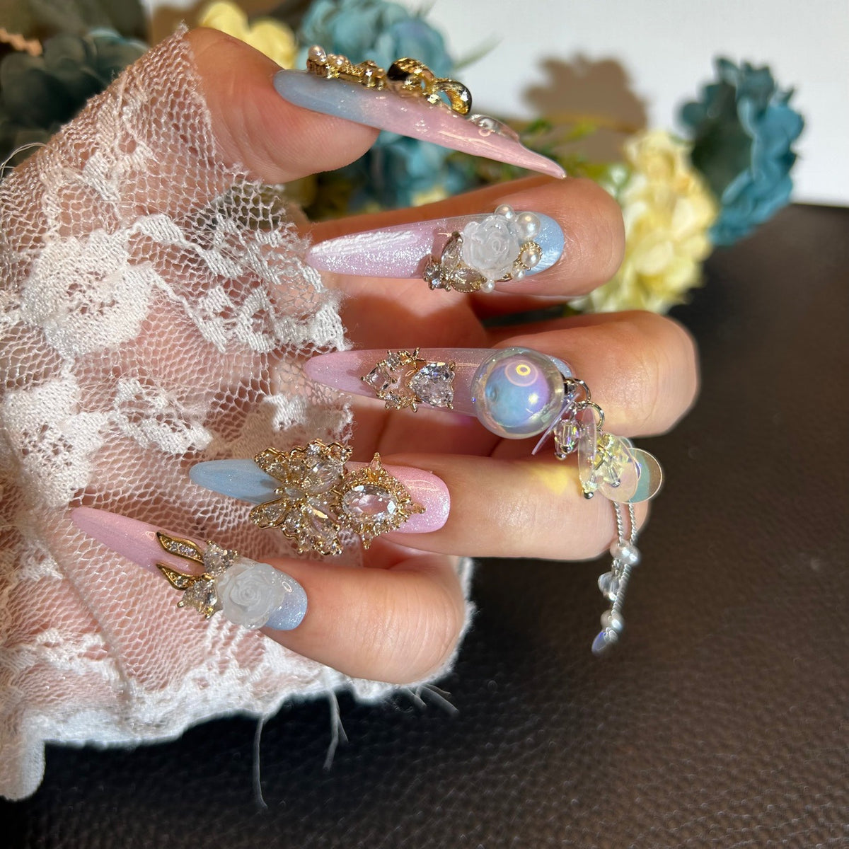 Handmade Pink Blue Gradient Cat Eye Long Stiletto Press On Nails with 3D White Roses, Gold Rhinestone Charms, Iridescent Bubble Ball & Pearl Chain Tassels