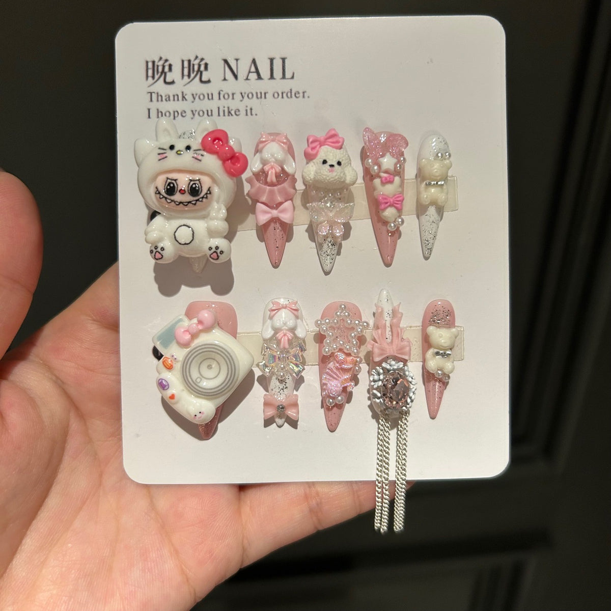 Handmade Pink White Press On Nails, Long Stiletto Kawaii False Nails with 3D Labubu Doll, Bunny, Bear & Camera Charms, Bows, Star Rhinestones & Silver Tassel Chains, Reusable Fake Nails for Cosplay & Birthday Party