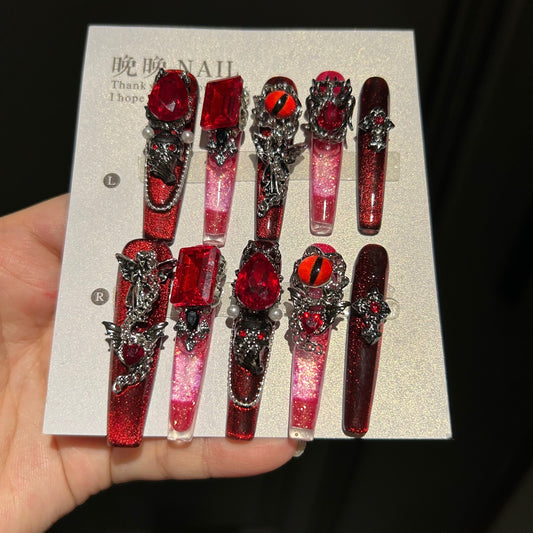 Handcrafted Designer Dark Aesthetic Press-on Nails - Shimmering Red-Black Base with Heavy 3D Gemstones, Skull Art and Cross Decals