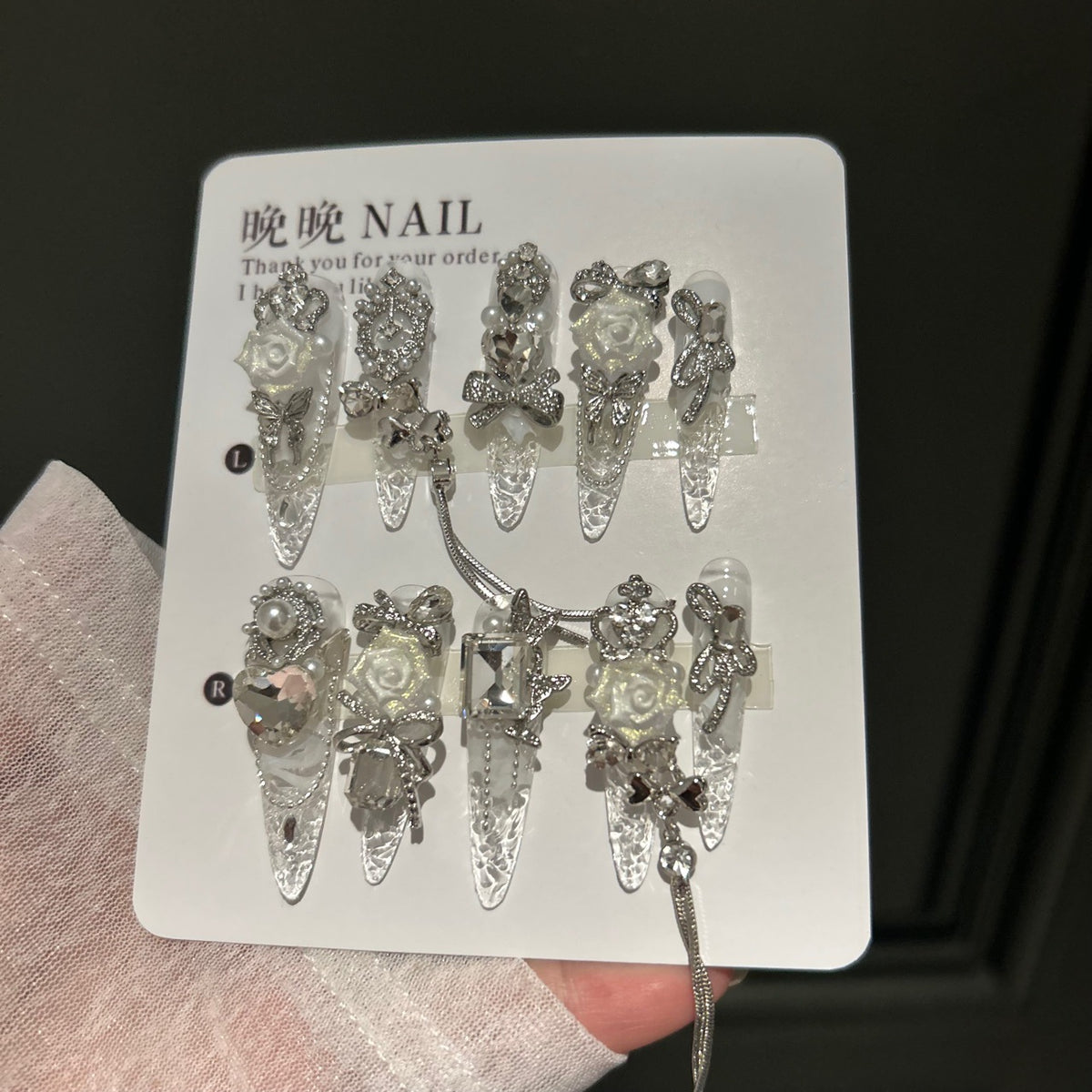 Handmade Clear Transparent Long Stiletto Press On Nails with 3D White Roses, Silver Rhinestone Bows, Crown & Butterfly Charms, Pearls & Dangling Silver Chains