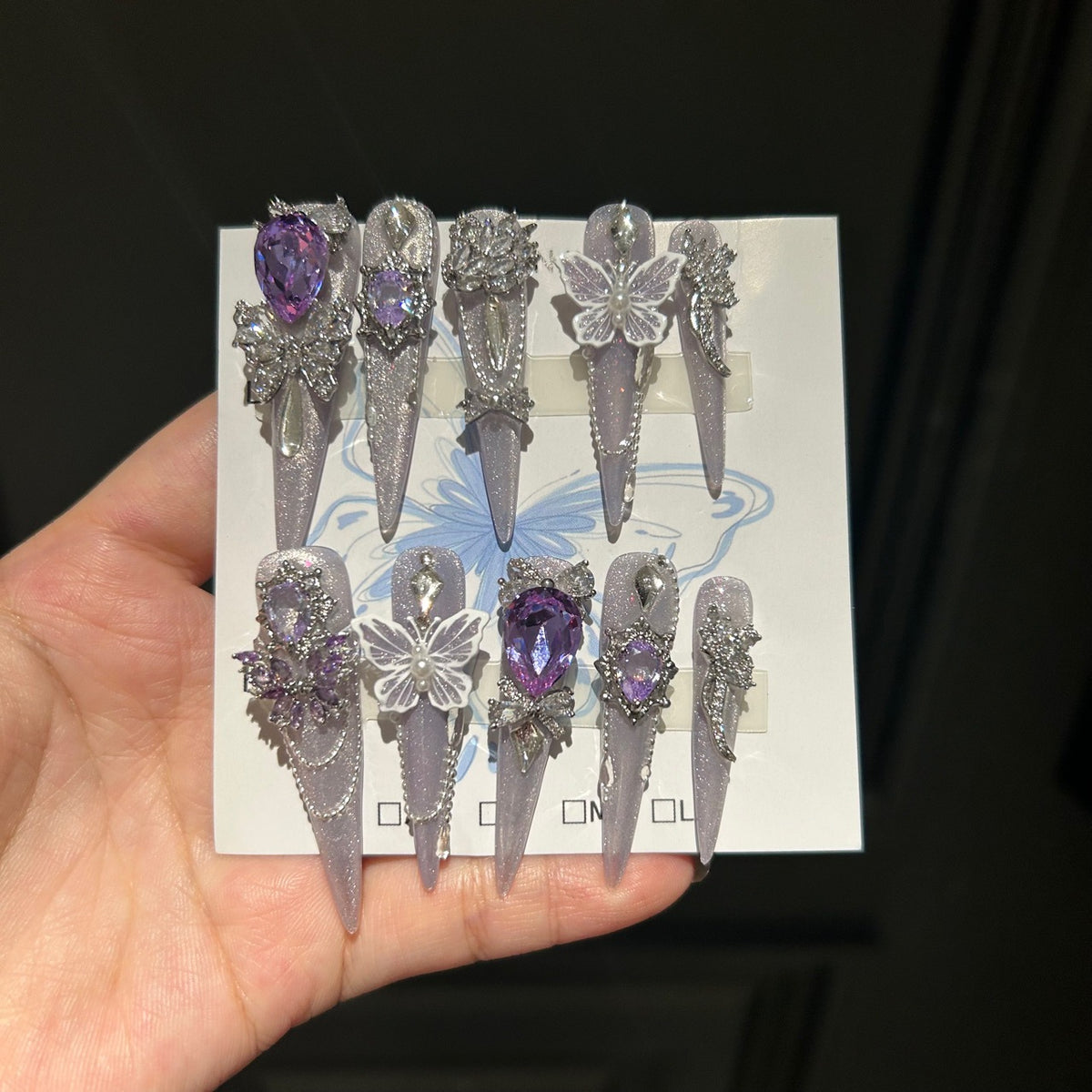 Smoky Purple Cat Eye Stiletto Press-on Nails with Over-sized Purple Crystal, White Bowknot, and Beaded Chain - Luxury Fairy Fake Nail Set