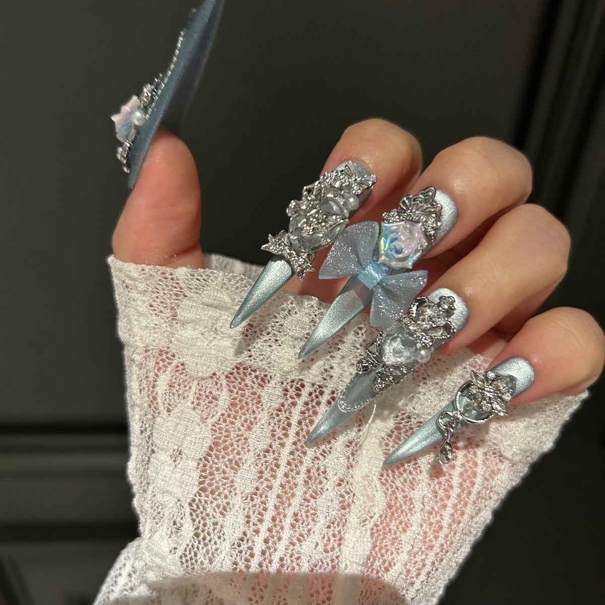 Handmade Ice Blue Cat Eye Long Stiletto Press On Nails with Iridescent 3D Roses, Glitter Bows, Butterfly Rhinestones, Pearls & Dangling Silver Chains