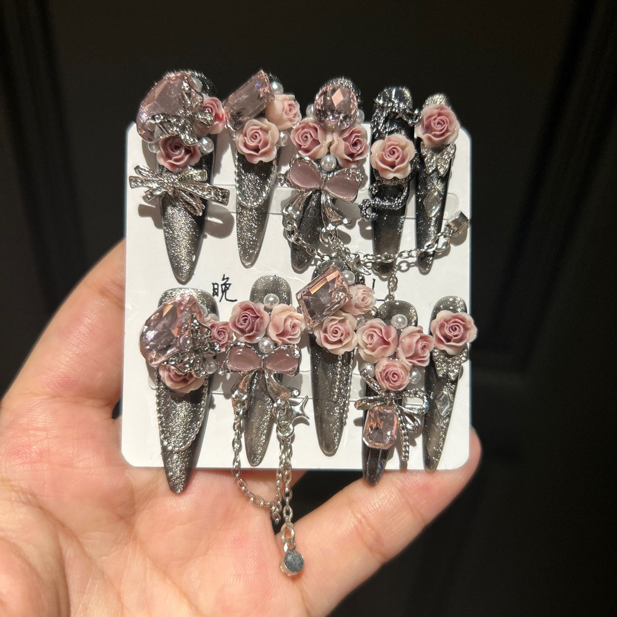 Handmade Dark Glitter Long Stiletto Press On Nails with 3D Dusty Pink Roses, Pink Crystal Charms, Bows, Butterfly Rhinestones & Interlinked Silver Chains